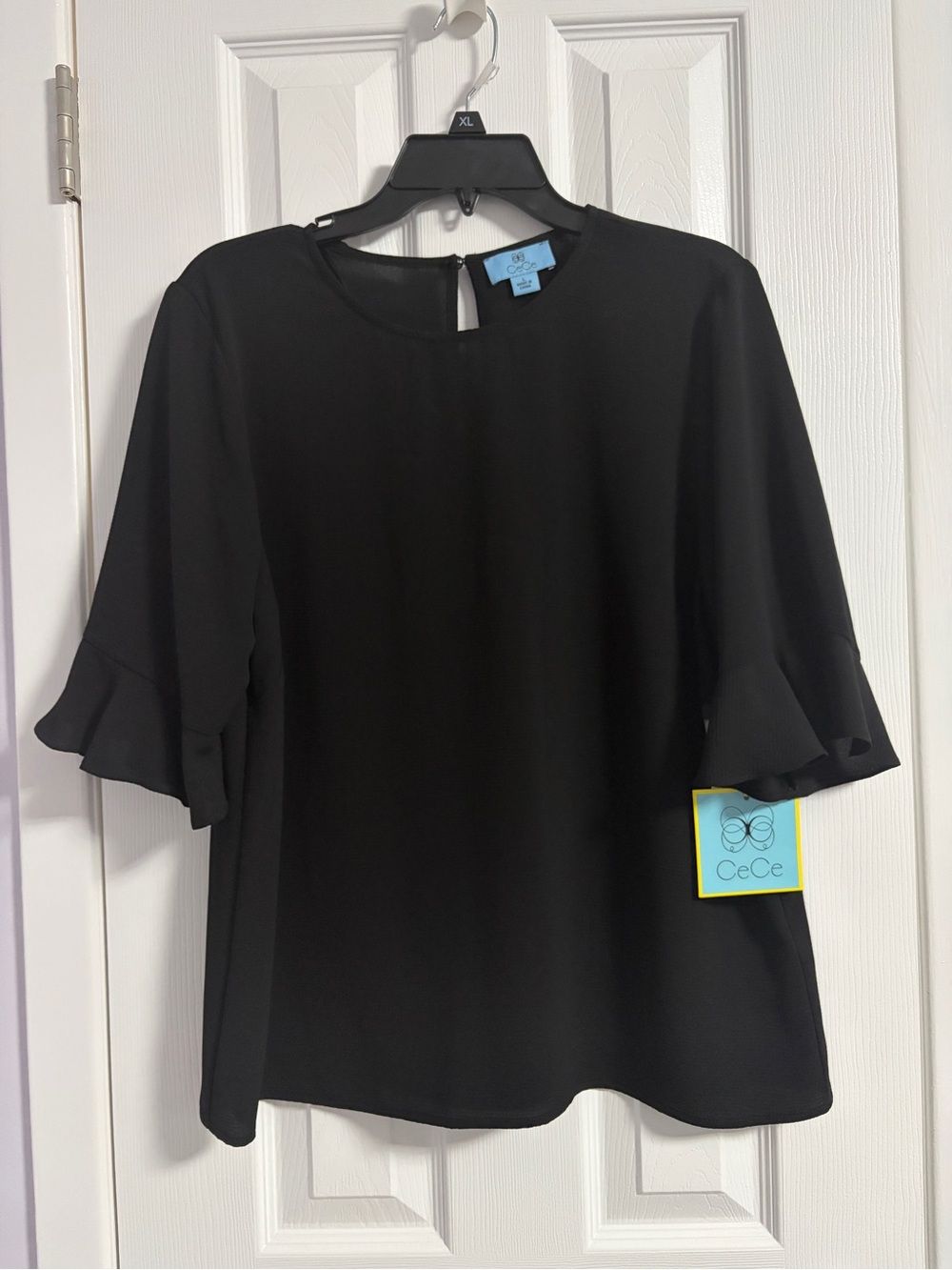 CeCe Black Ruffle-Sleeve Blouse